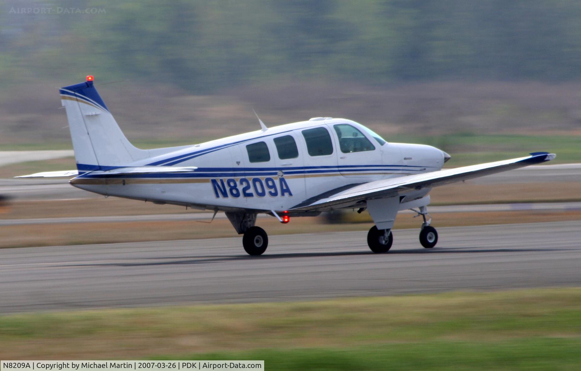 N8209A, 1993 Beech A36 Bonanza 36 C/N E-2781, Landing Runway 20R