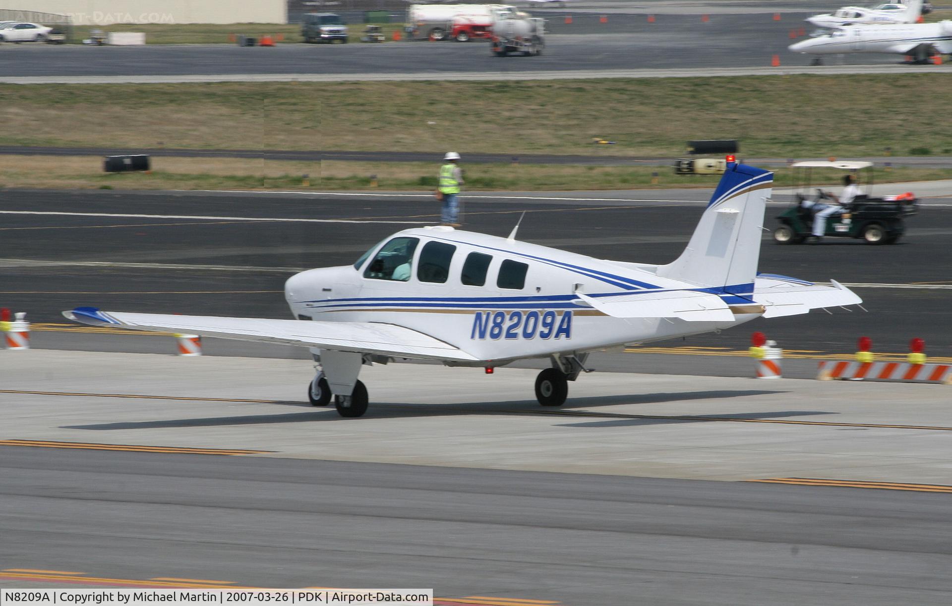 N8209A, 1993 Beech A36 Bonanza 36 C/N E-2781, Taxing to Epps Air Service