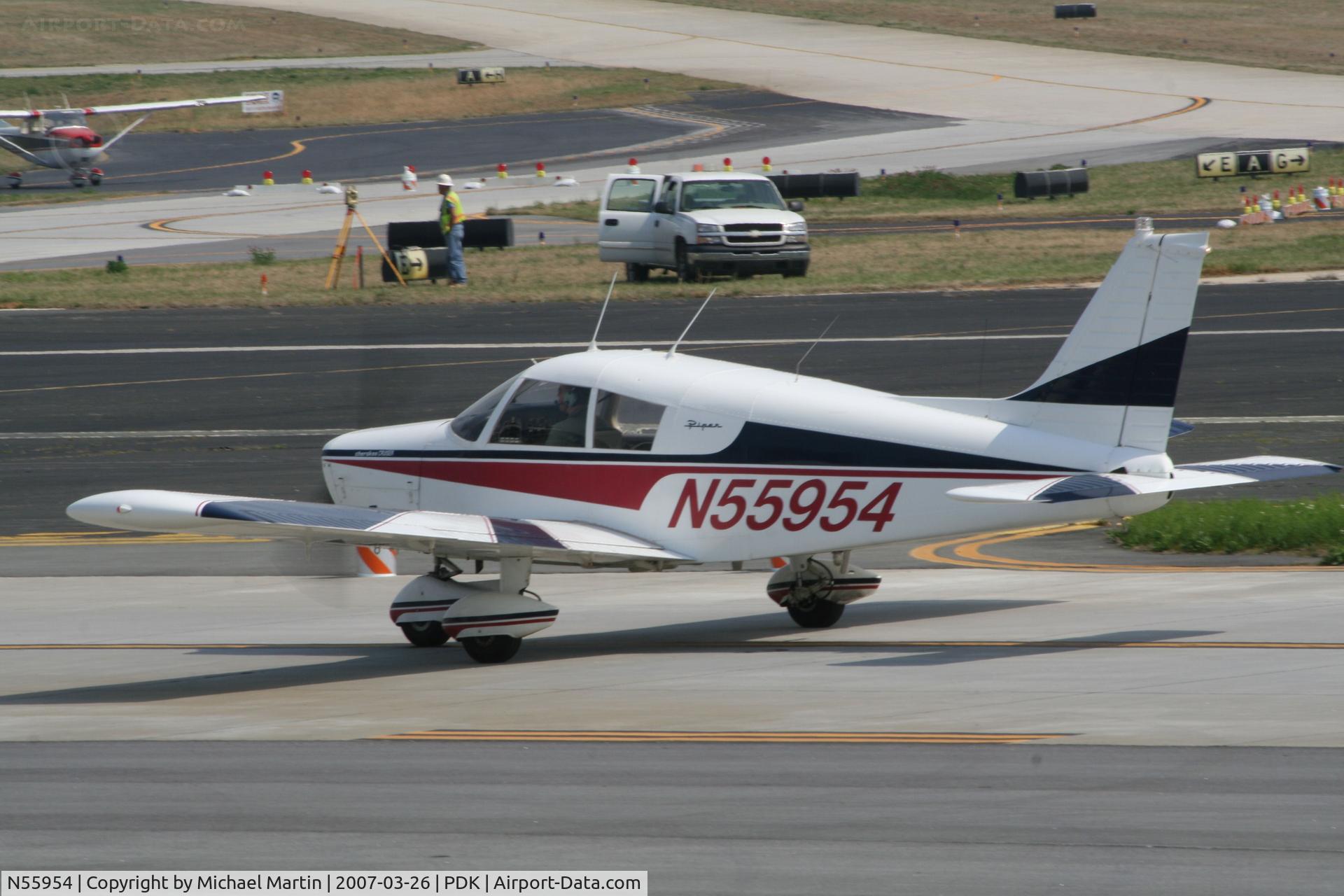 N55954, 1973 Piper PA-28-140 C/N 28-7325539, Taxing past on going construction