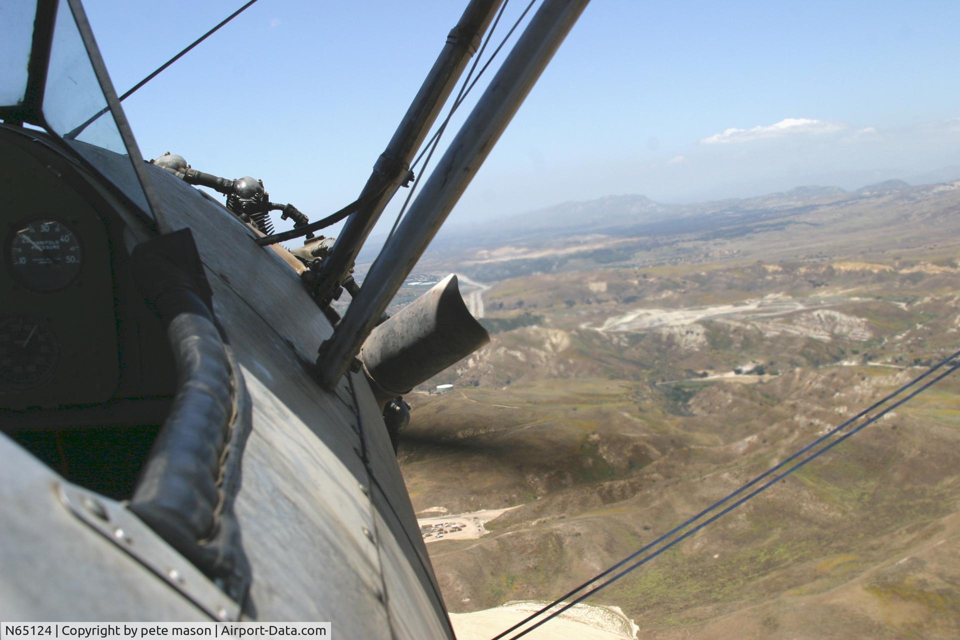 N65124, 1943 Boeing A75N1(PT17) C/N 75-1260, banner tow near simi valley CA