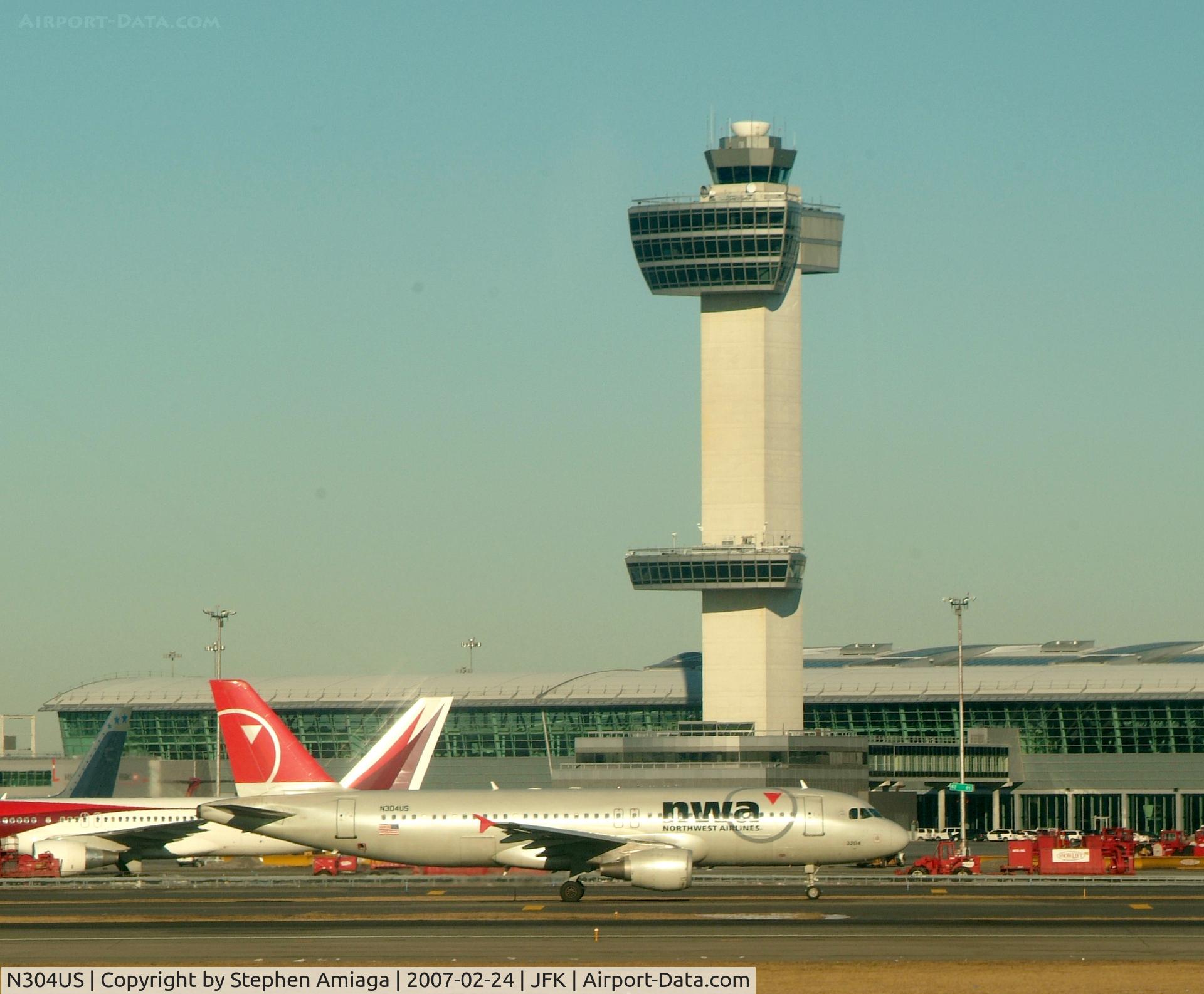 N304US, 1989 Airbus A320-211 C/N 040, Here we go... Tower and Terminal 4 IAT behind