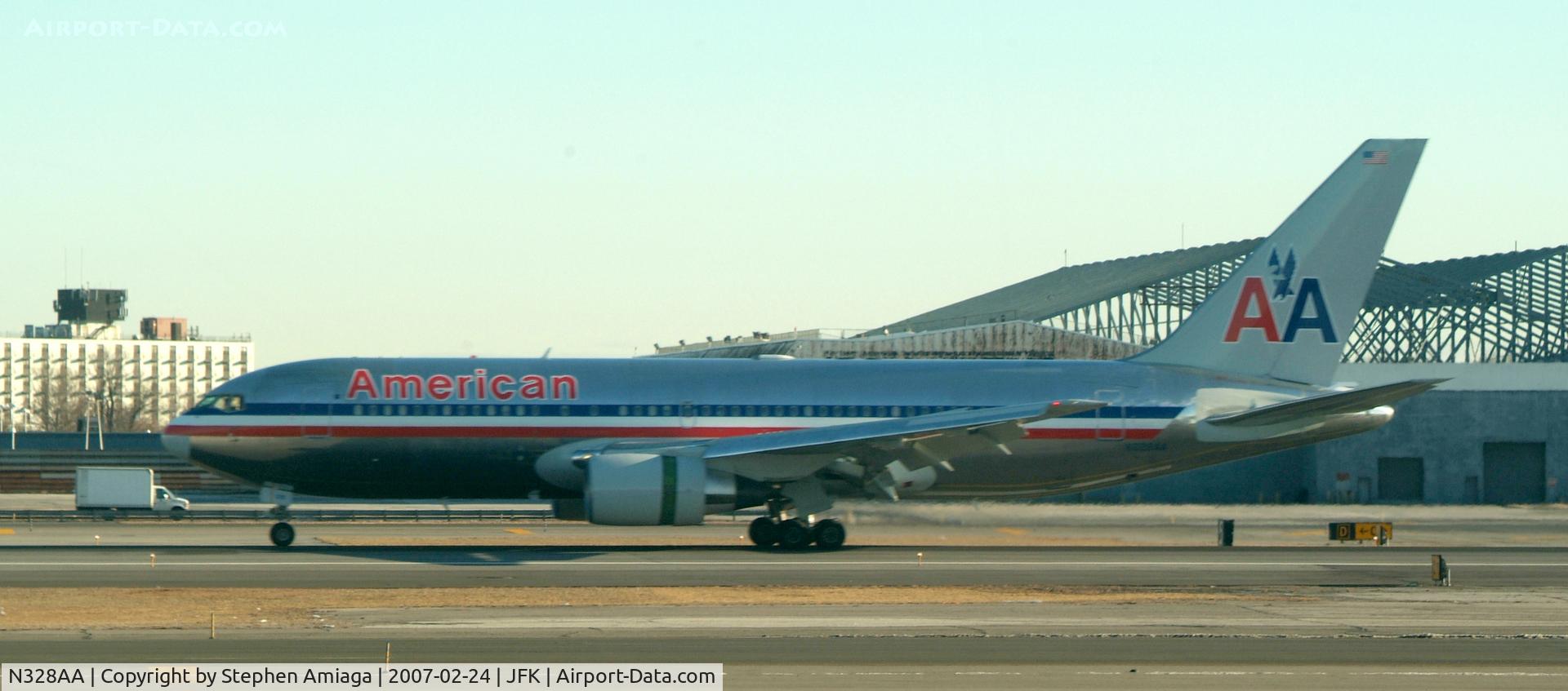 N328AA, 1986 Boeing 767-223 C/N 22328, Landing roll RWY 31R...