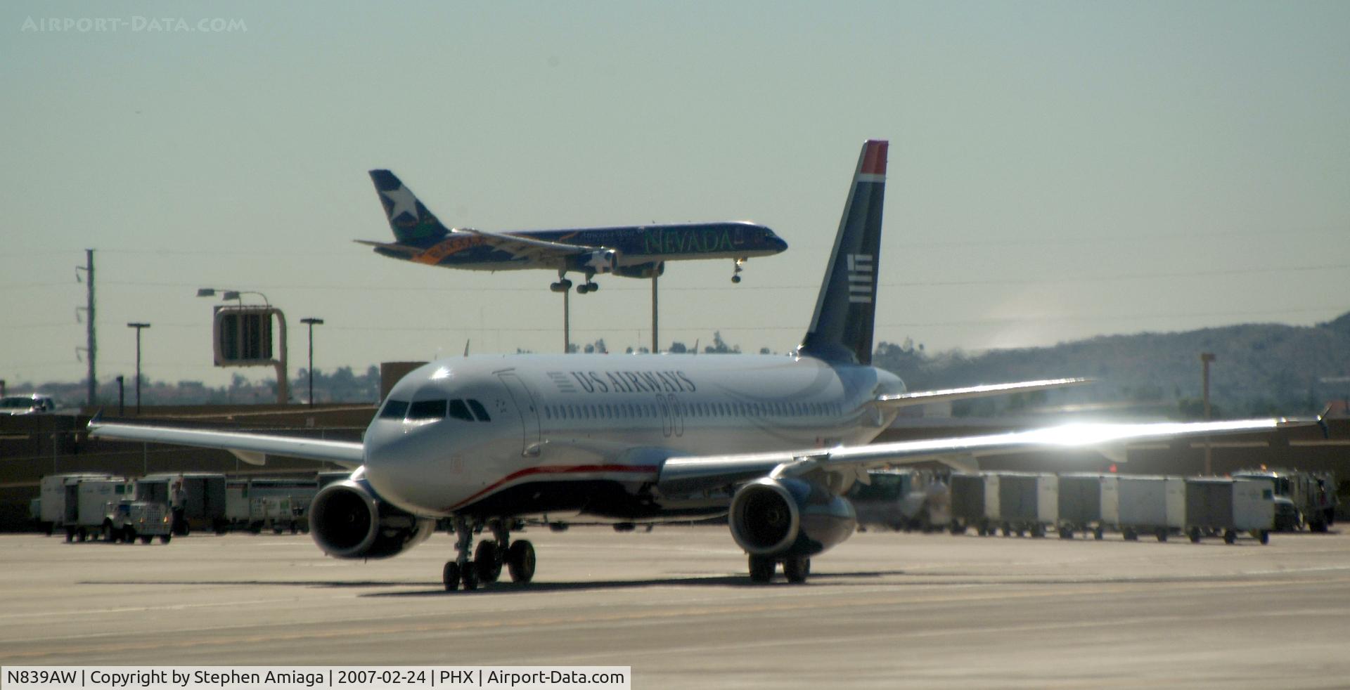 N839AW, 2006 Airbus A319-132 C/N 2669, Taxiing in with 915AW Landing behind her