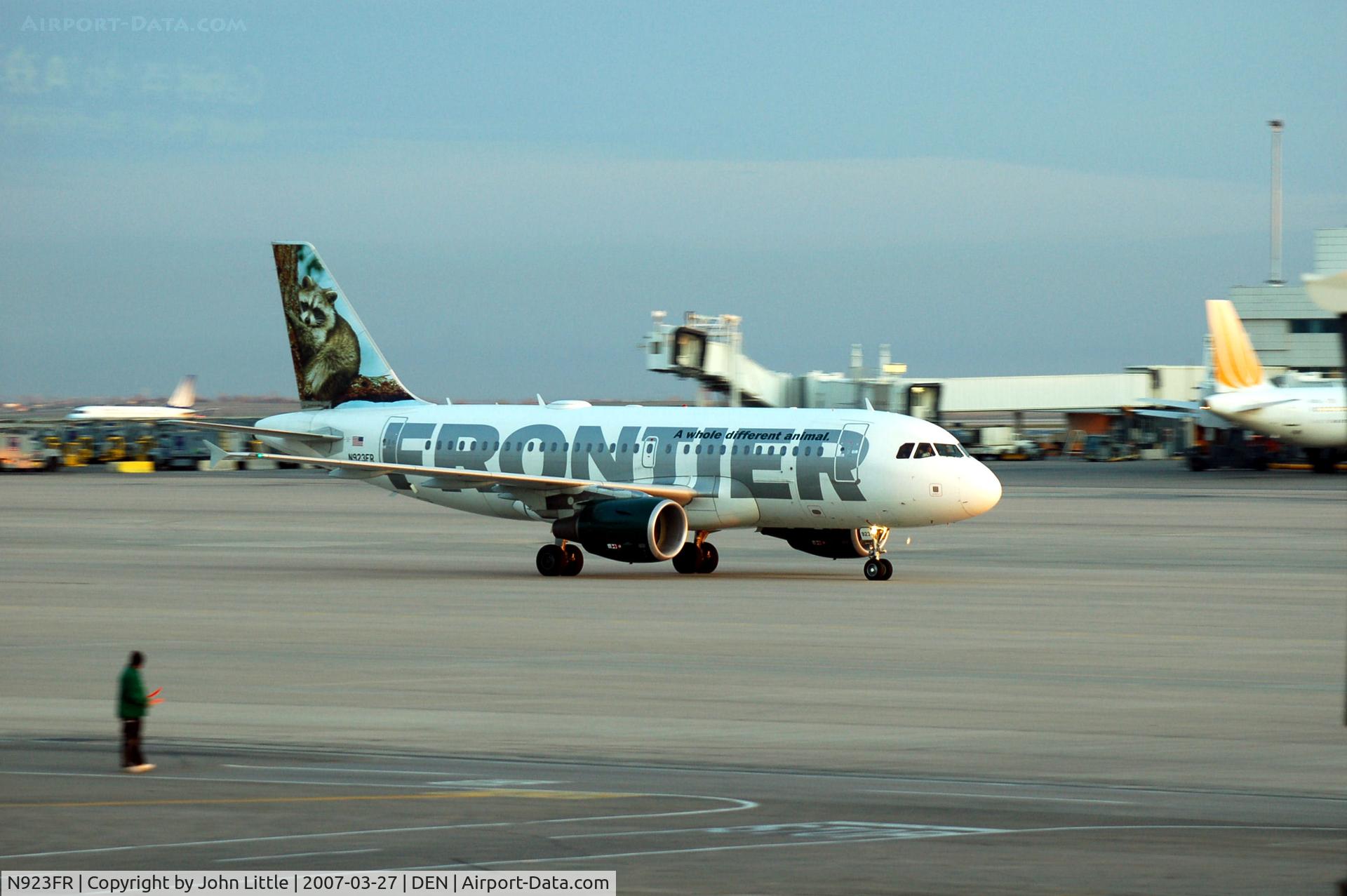 N923FR, 2003 Airbus A319-111 C/N 2019, Heavy Overcast Morning, Light just comming up at DIA, Frontier Airlines