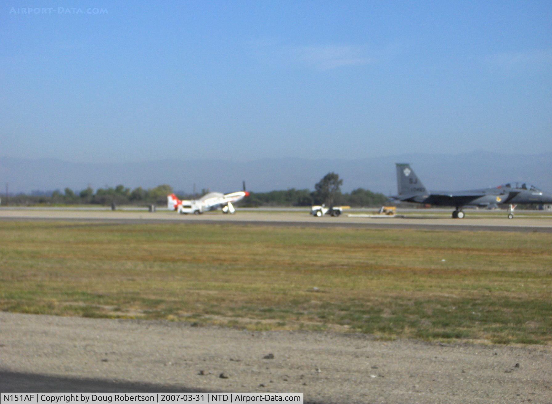 N151AF, 1945 North American P-51D Mustang C/N 45-11525, 1945 North American P-51D MUSTANG 'Val-Halla', Rolls Royce Packard Merlin V-1650-7 1,490 Hp, Limited class exhibition. USAF Ccommemorative Heritage Flight WWII vintage participant with current F-15-E STRIKE EAGLE shown to right of MUSTANG