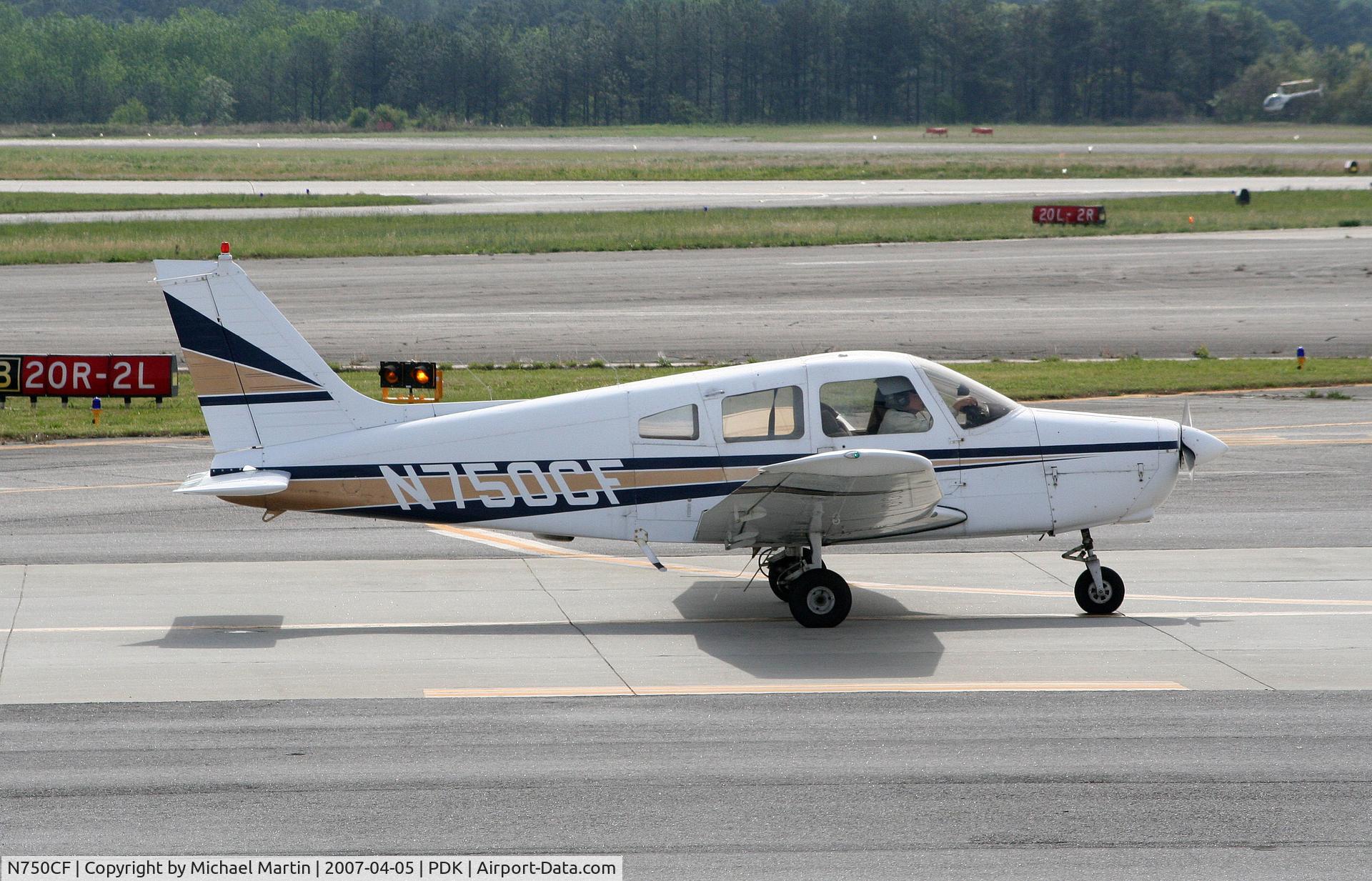 N750CF, 1977 Piper PA-28-161 C/N 28-7716152, Taxing to Runway 2L