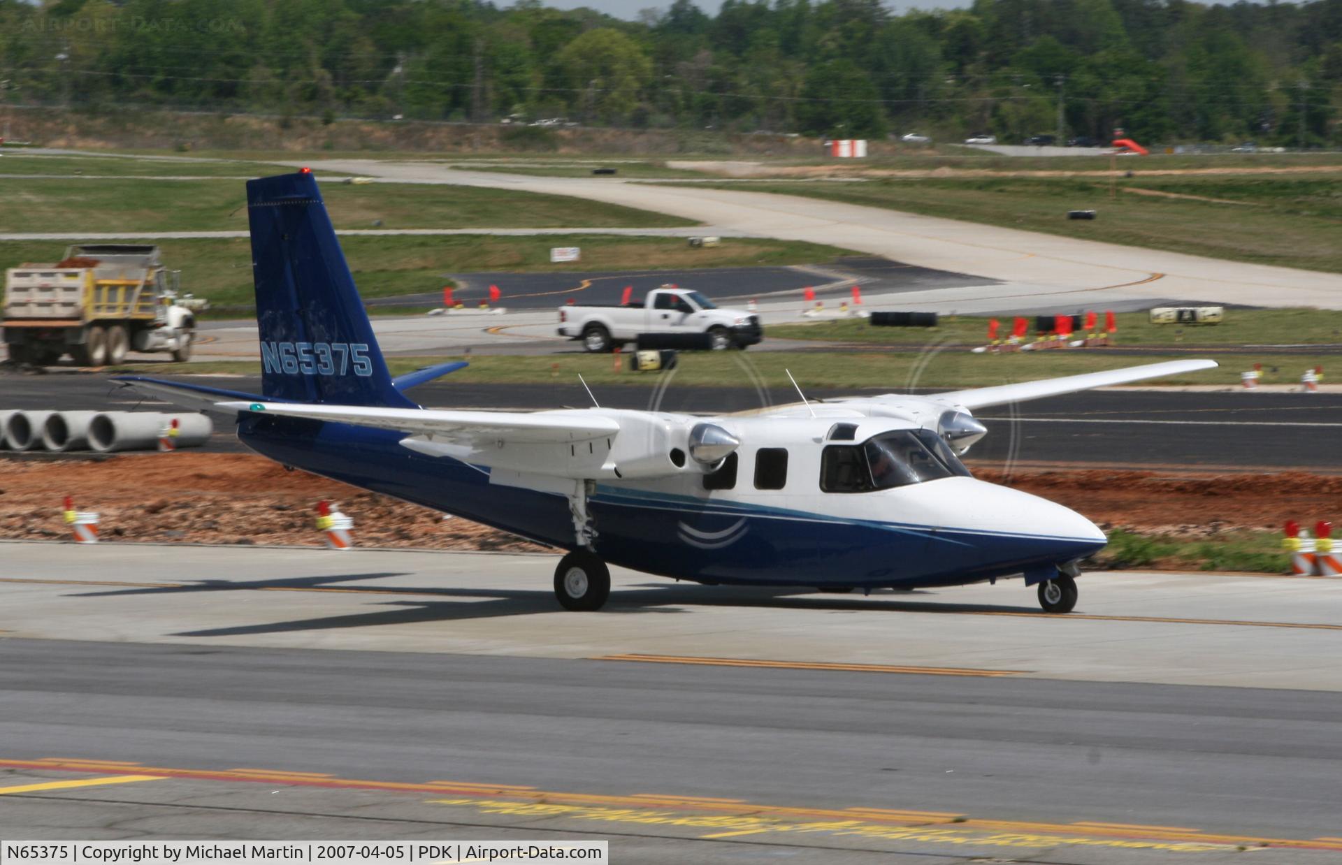 N65375, 1974 Aero Commander 500 S C/N 3181, Taxing past on going construction