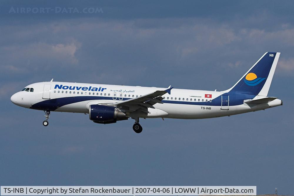 TS-INB, 2000 Airbus A320-214 C/N 1175, Nice background.