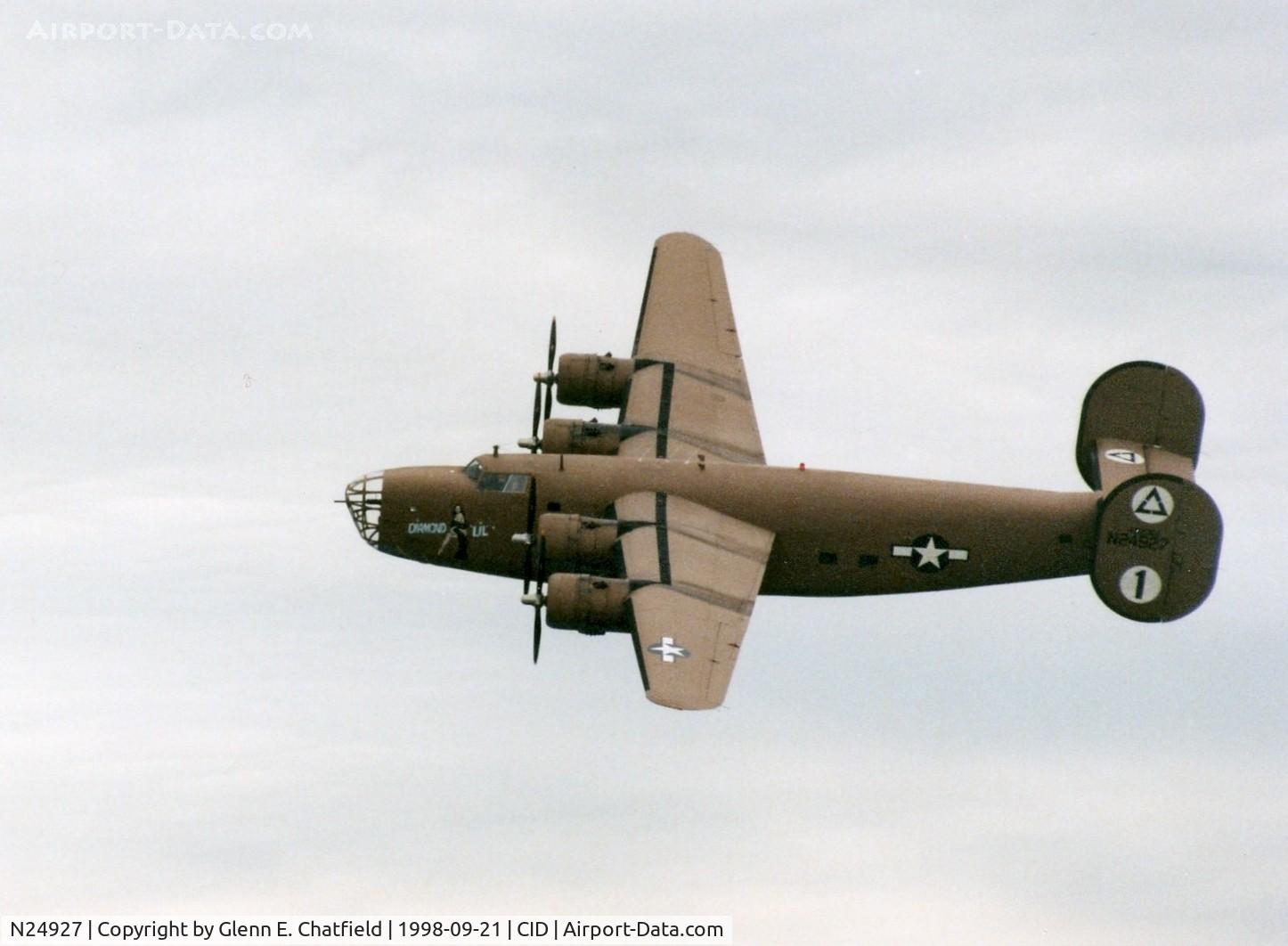 N24927, 1940 Consolidated Vultee RLB30 (B-24) C/N 18, Flying by the  control tower