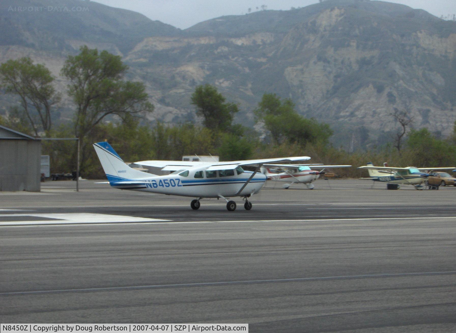 N8450Z, 1963 Cessna 210-5 (205) C/N 2050450, 1963 Cessna 210-5 (205) UTILINE (fixed gear version of 210C) Continental IO-470-E 260 Hp, 6 place. Takeoff roll Rwy 22