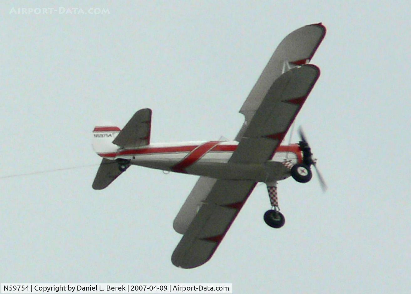 N59754, 1940 Boeing A75N1(PT17) C/N 75-483, Some 47 years after she was built, this Stearman was still plying her trade as a banner tow plane.
