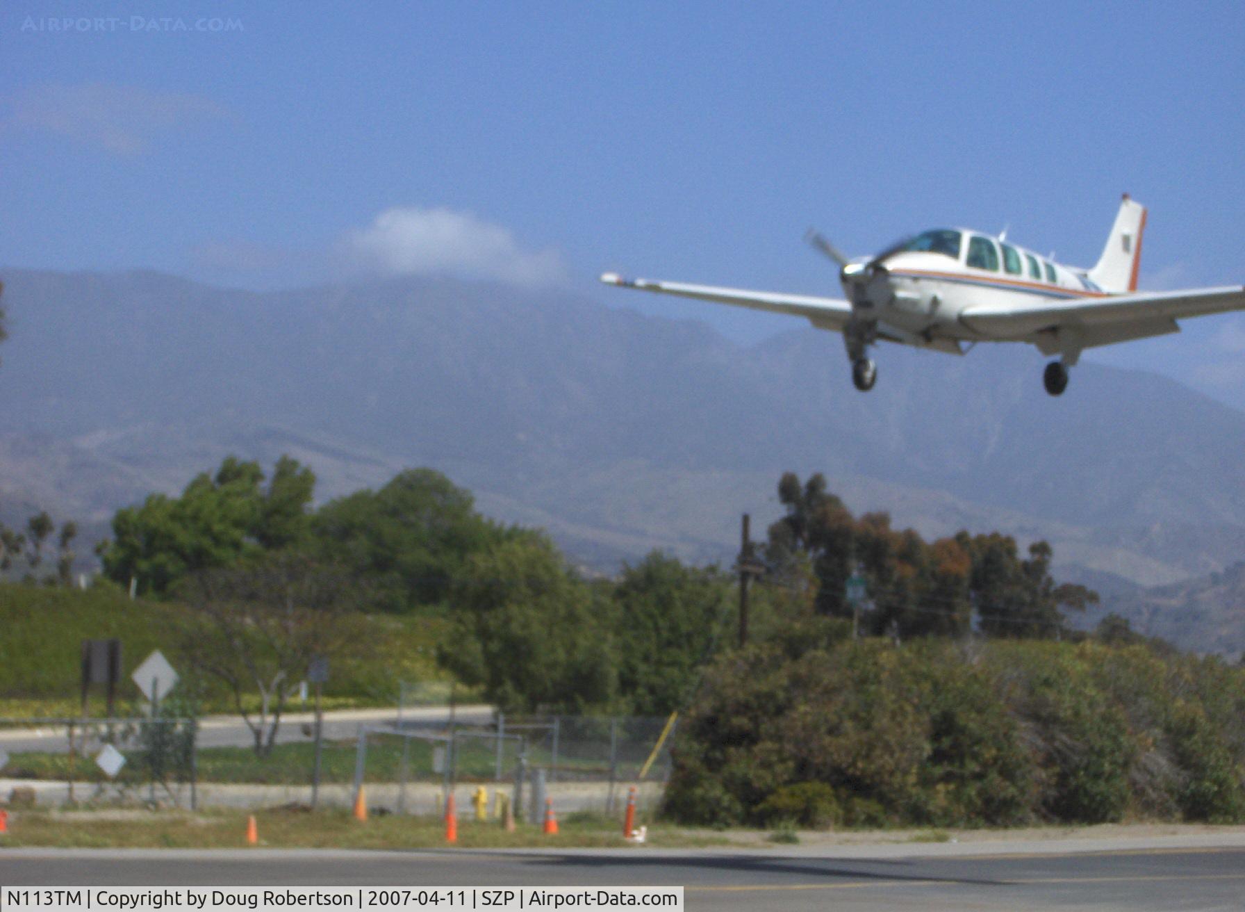 N113TM, 1983 Beech B36TC Bonanza C/N EA-386, 1983 Beech B36TC BONANZA, Continental TSIO-520 Turbo Charged 300 Hp, on short final for Rwy 22