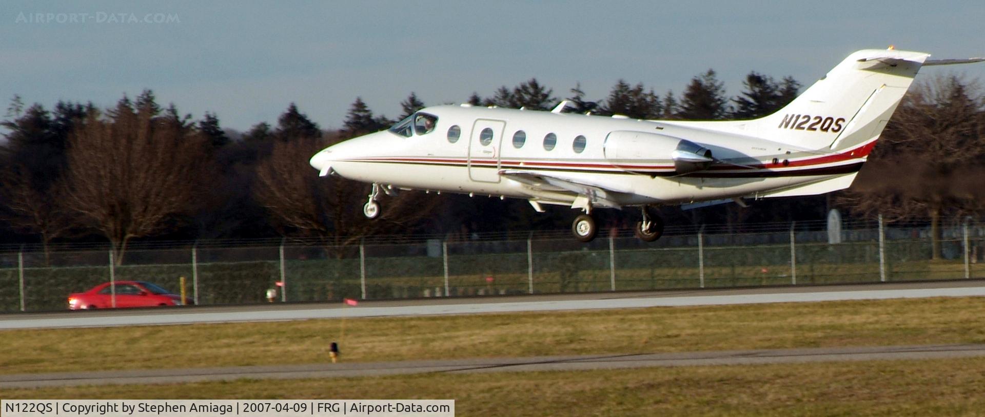 N122QS, Raytheon Aircraft Company 400A C/N RK-467, 2QS about to touch down...