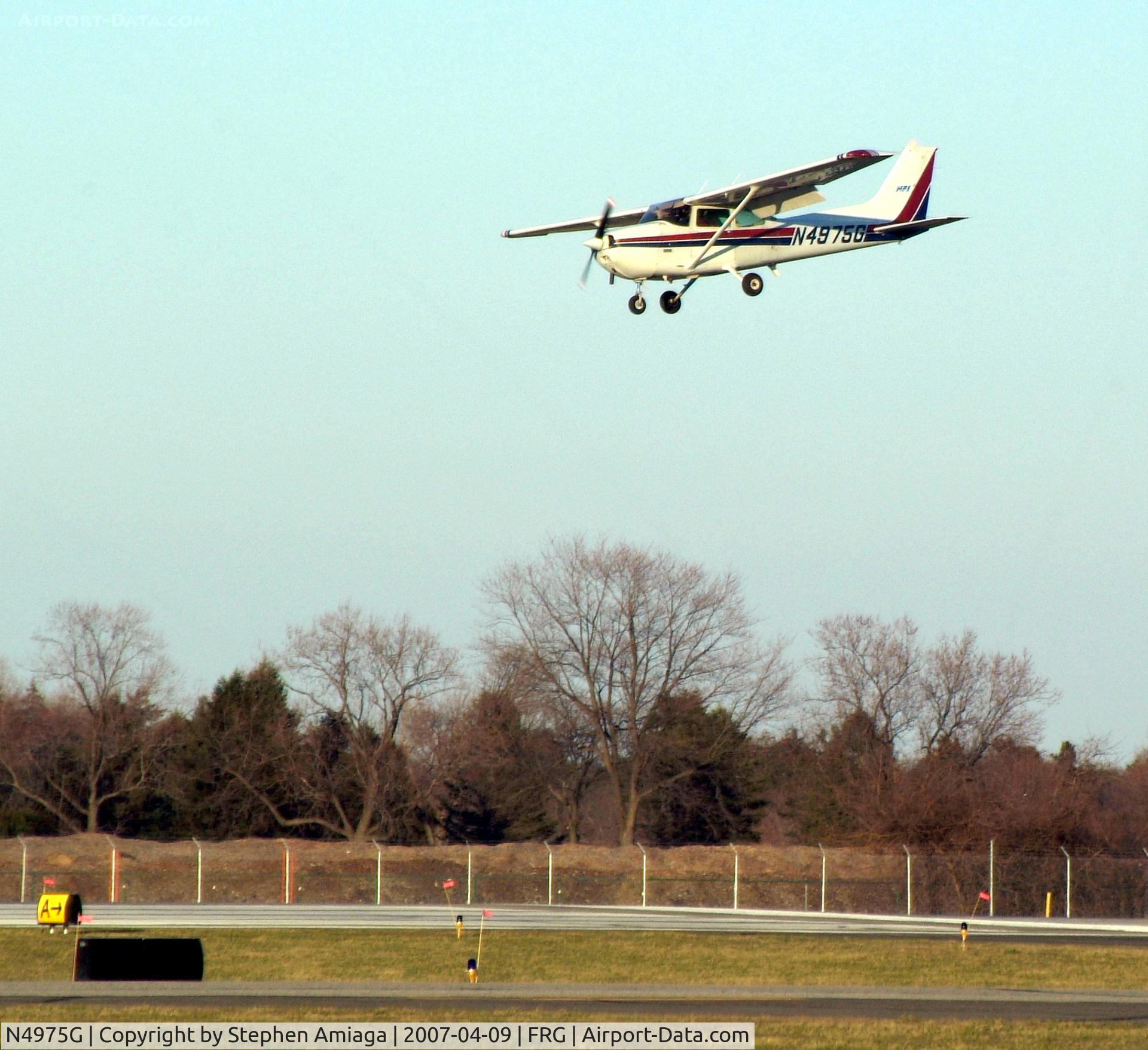 N4975G, 1979 Cessna 172N C/N 17273522, Skyhawk clears the imaginary 50' obstacle...