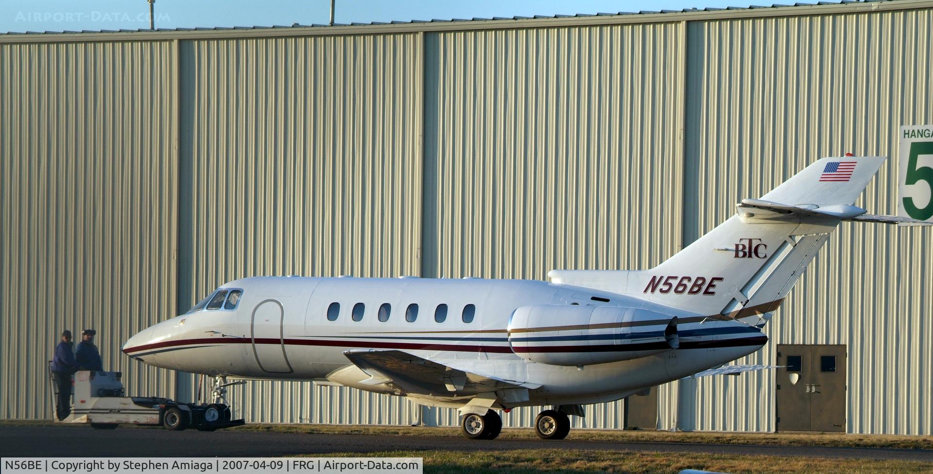 N56BE, 2001 Raytheon Hawker 800XP C/N 258527, Linemen towing her home ending another day...