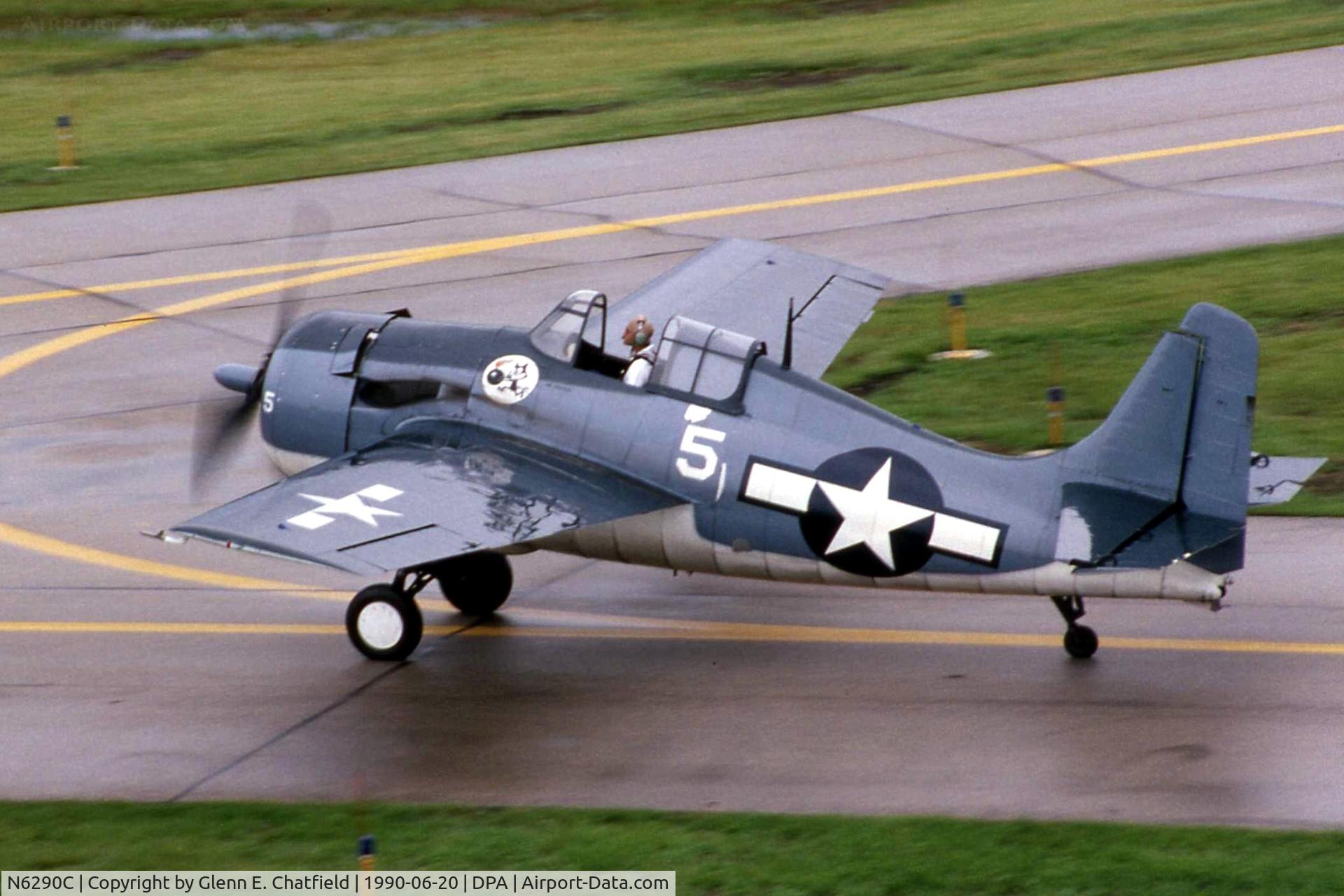 N6290C, 1945 General Motors (Grumman) FM-2 Wildcat C/N 5804, FM-2 86746 taxiing by the tower in the rain