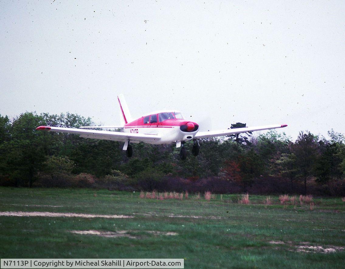 N7113P, 1960 Piper PA-24 Comanche C/N 24-1879, On approach Edwards Airport Long Island NY June 1975 (Airport no longer in use)