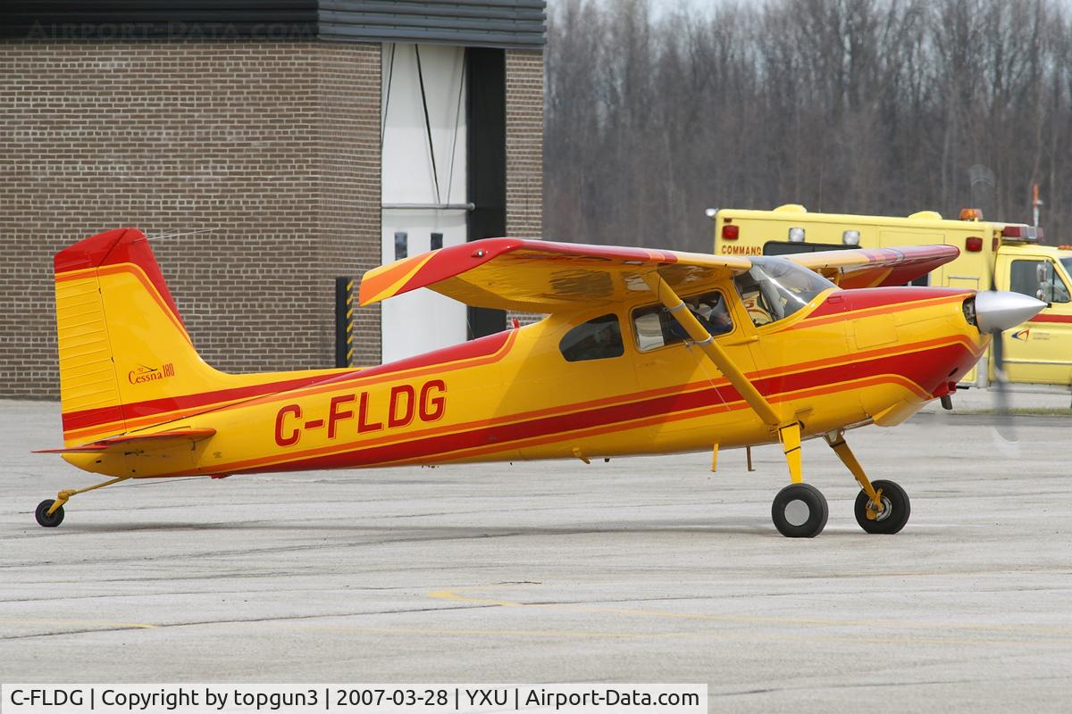C-FLDG, 1957 Cessna 180A C/N 32998, Taxiing across Ramp II.