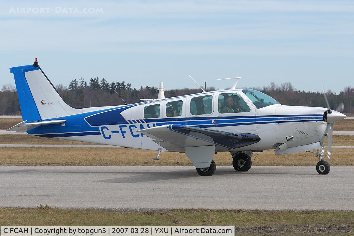 C-FCAH, 1968 Beech 36 Bonanza C/N E-13, Taxiing across Ramp III.
