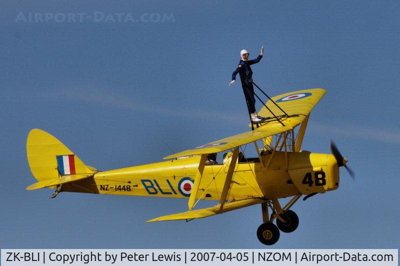 ZK-BLI, De Havilland New Zealand DH-82A Tiger Moth C/N DHNZ128, ZK-BLI Tiger with wingwalker