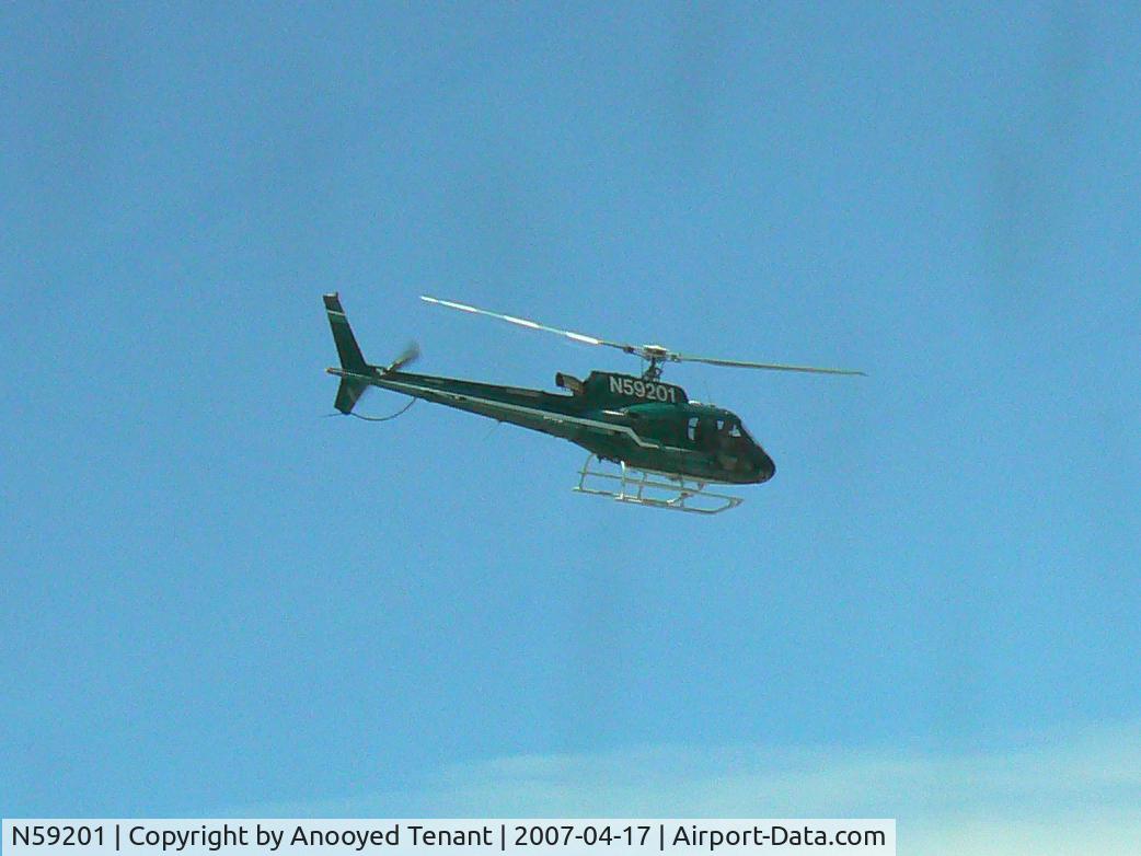 N59201, 2004 Eurocopter AS-350B-3 Ecureuil Ecureuil C/N 3853, Buzzing our building in Bradenton, FL