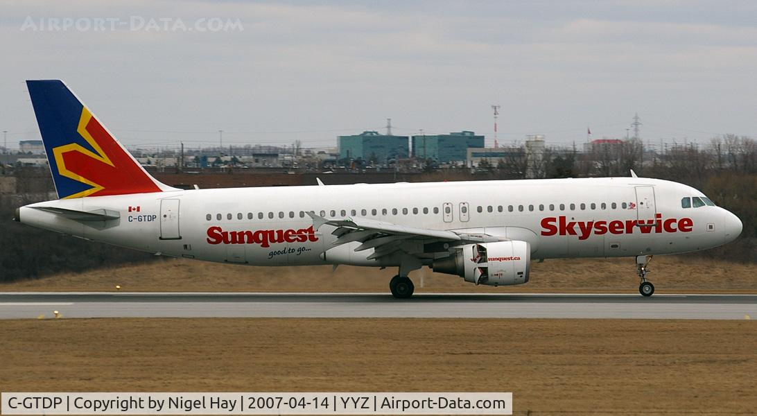 C-GTDP, 2002 Airbus A320-214 C/N 1780, Landing on 33L