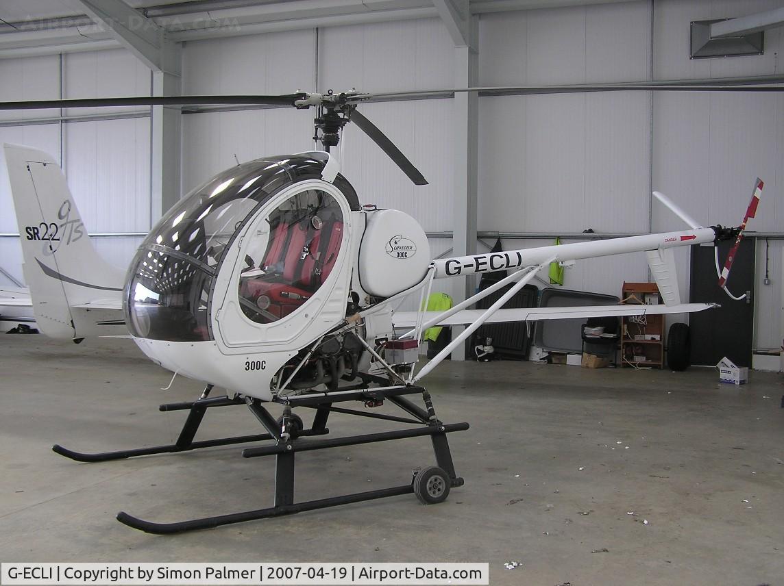 G-ECLI, 1999 Schweizer 269C C/N S-1784, Schweizer 300C in hangar at Turweston