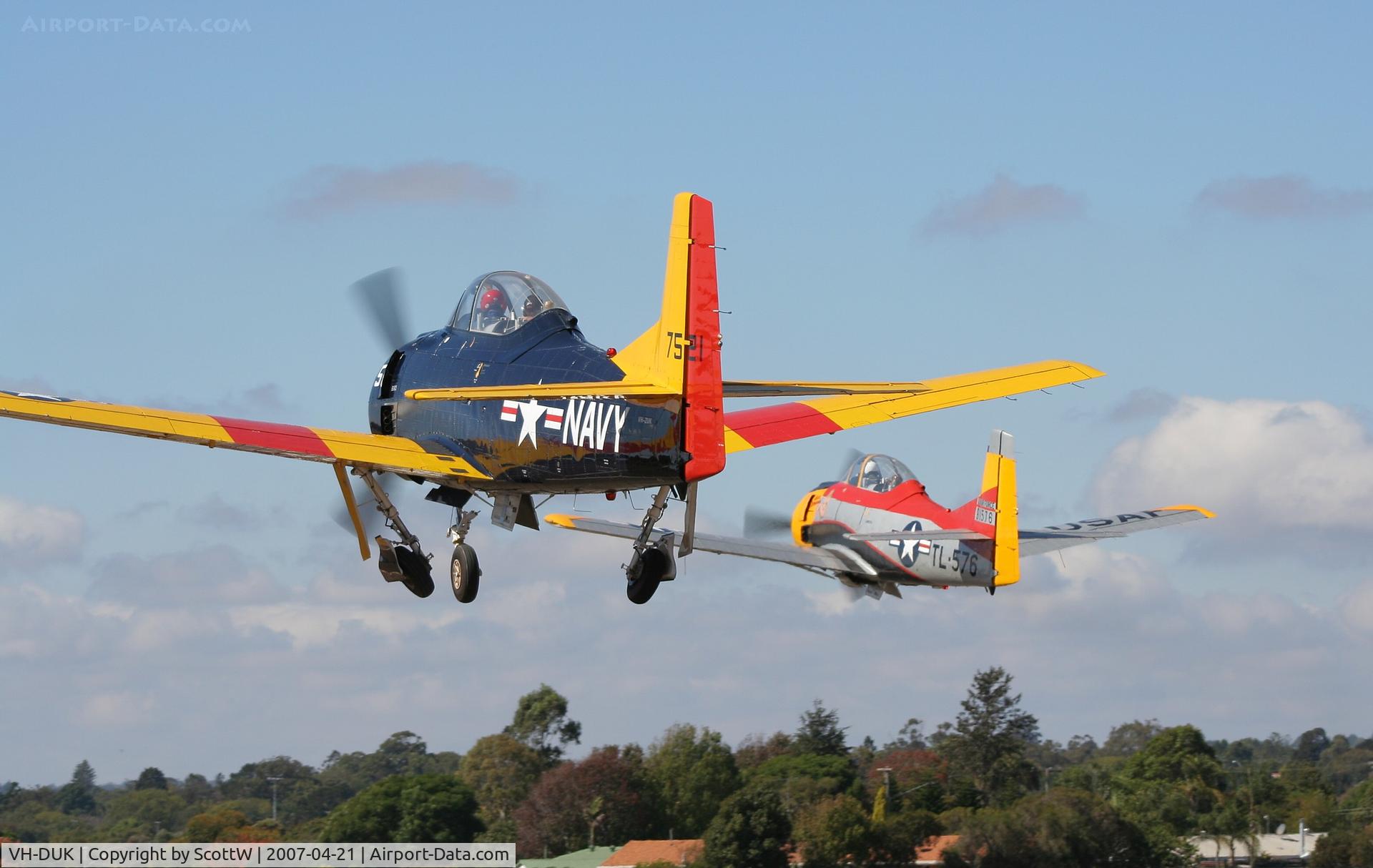 VH-DUK, 1951 North American T-28D Trojan C/N 173-374, This aircraft has just been re-registered to VH-ZUK and the aircraft will be operated out of Toowoomba QLD operating Joyflights. In formation take-off with VH-ZUC