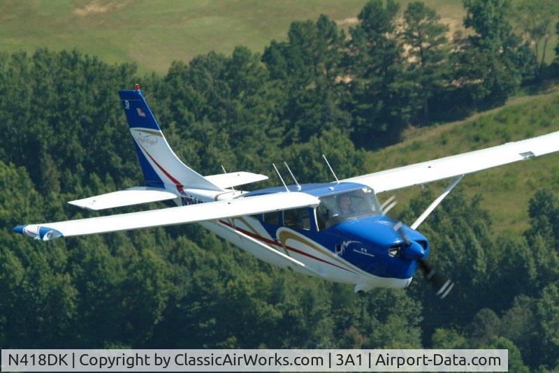 N418DK, 1964 Cessna 210D Centurion C/N 21058435, N418DK in flight over Guntersville, AL