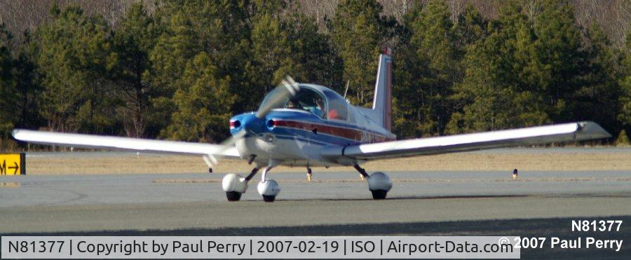 N81377, 1977 Grumman American AA-5B Tiger C/N AA5B0516, Taxiing in to the GA parking area