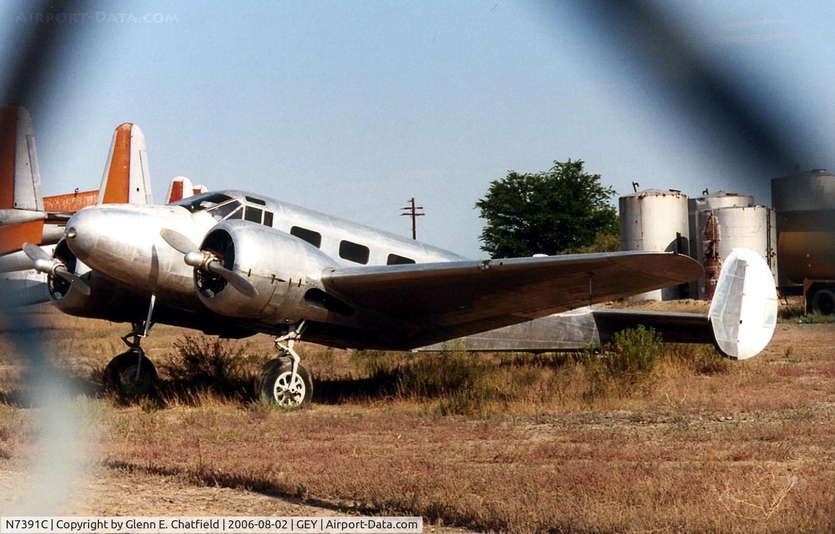 N7391C, 1957 Beech C18S (C-45F) C/N 8460 (44-87201), C-45F 44-87201 at Greybull, WY. 