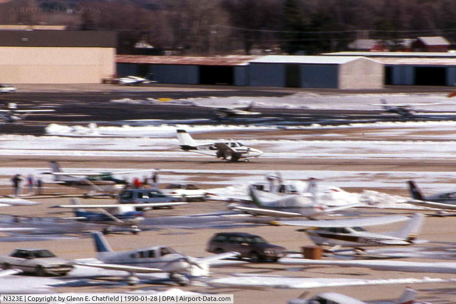 N323E, 1963 Beech 95-A55 Baron C/N TC-421, Gear stuck in transit, landing runway 15 with fire trucks standing by.  Good job.