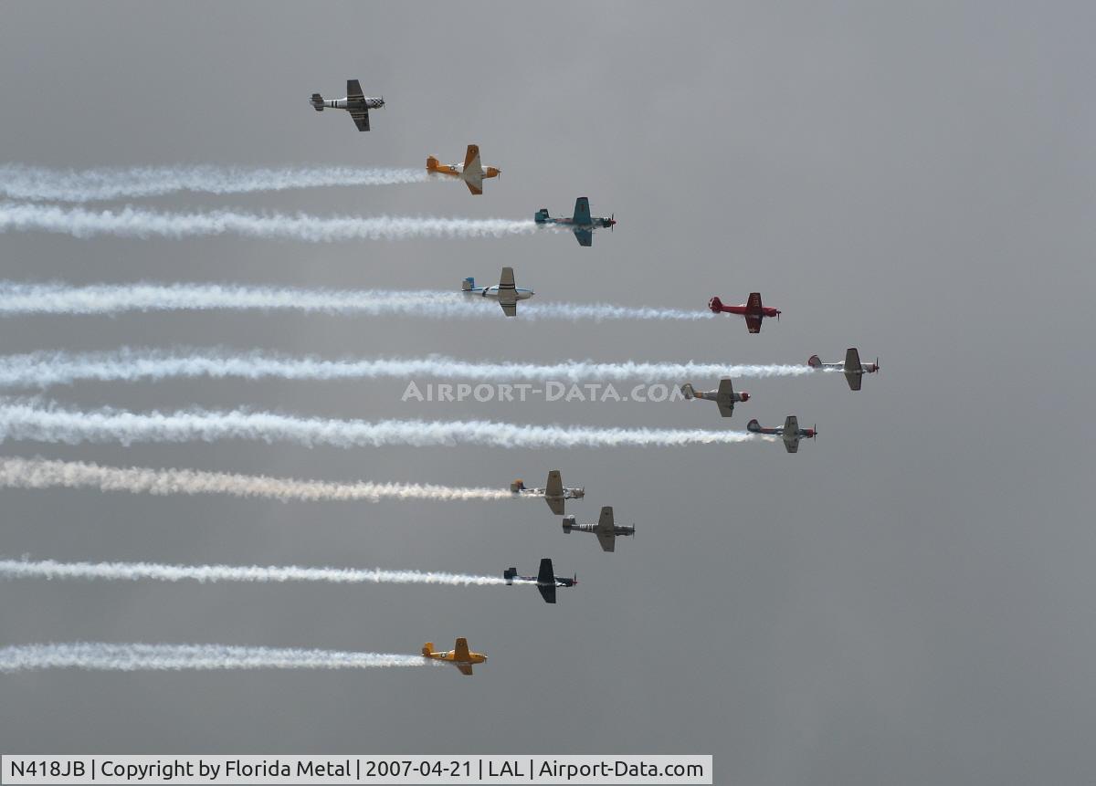 N418JB, 2001 Yakovlev (Aerostar) Yak-52TW C/N 0112228, Leading the formation