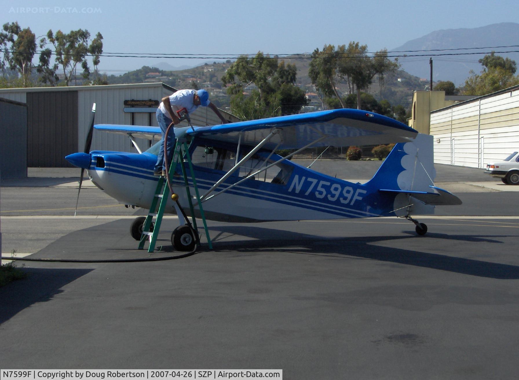 N7599F, 1970 Champion 7ECA Citabria C/N 745-70, 1970 Champion 7ECA CITABRIA, Lycoming O-235 115 Hp, refueling at aircraft's home field