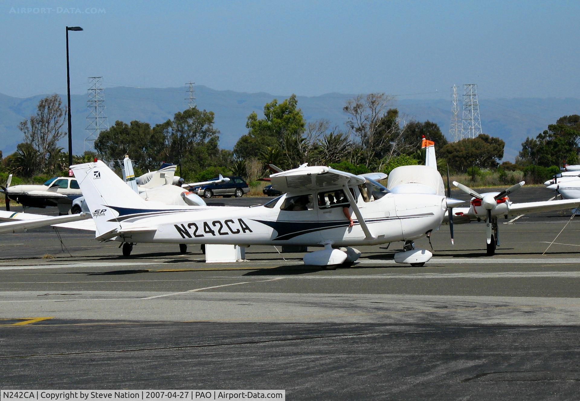 N242CA, 2004 Cessna 172S C/N 172S9630, Coiled Springs Ventures 2004 Cessna 172S taxying @ Palo Alto, CA