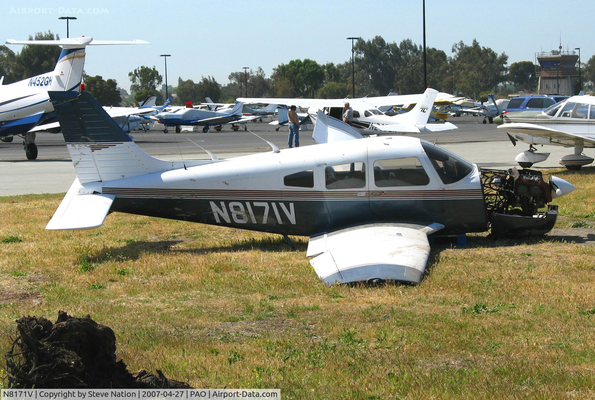 N8171V, 1980 Piper PA-28-161 C/N 28-8016282, Wreck of Shoreline Flying Club 1980 Piper PA-28-161 with bent left wing after forced landing @ Palo Alto, CA. Crash occured on April 23, 2007 when aircraft lost power immediately after take-off from PAO and came to rest in a marsh.  Repairable, no injury