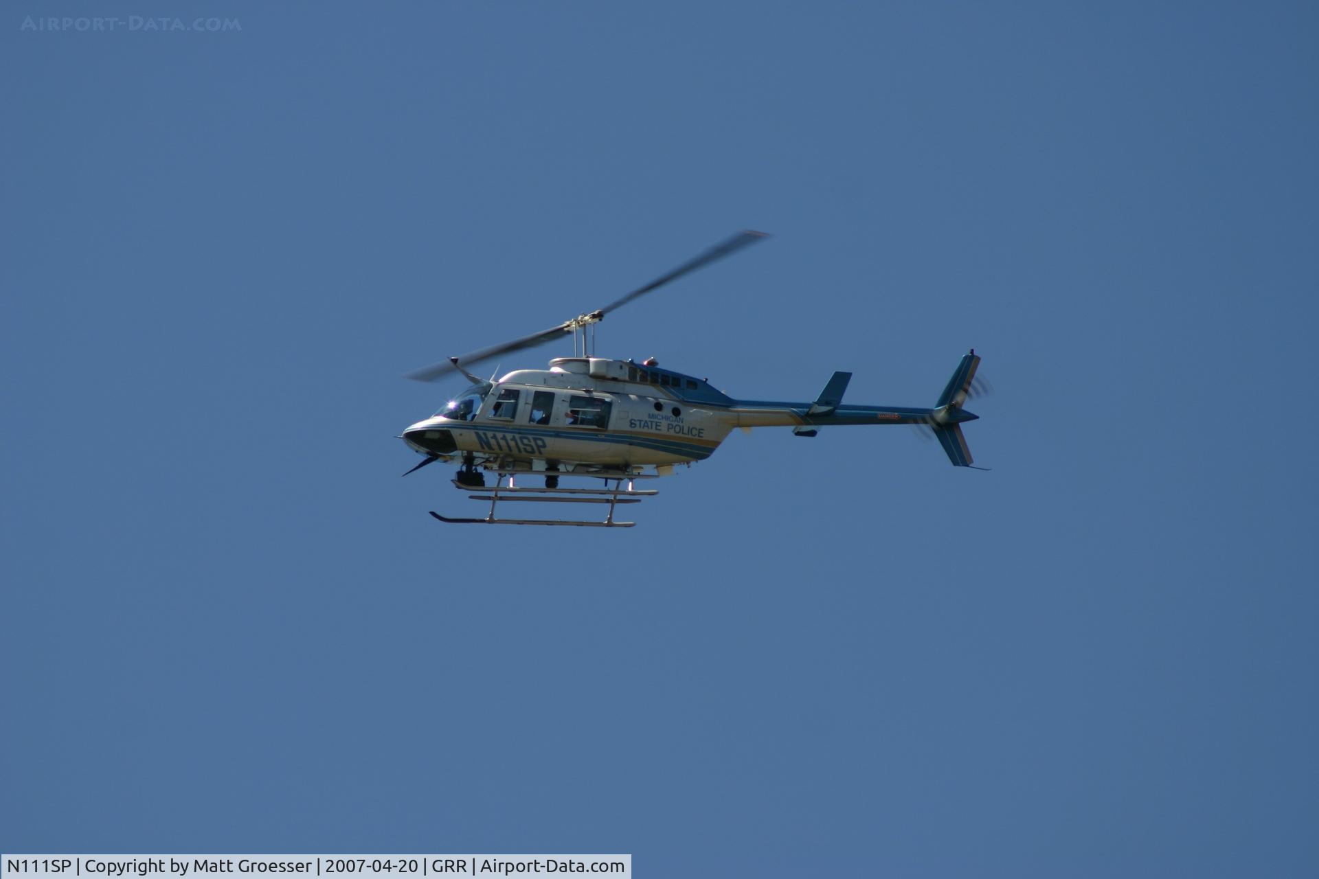 N111SP, 1990 Bell 206L-3 LongRanger III C/N 51325, Michigan State Police helicopter over East Grand Rapids for recent visit of President George W. Bush