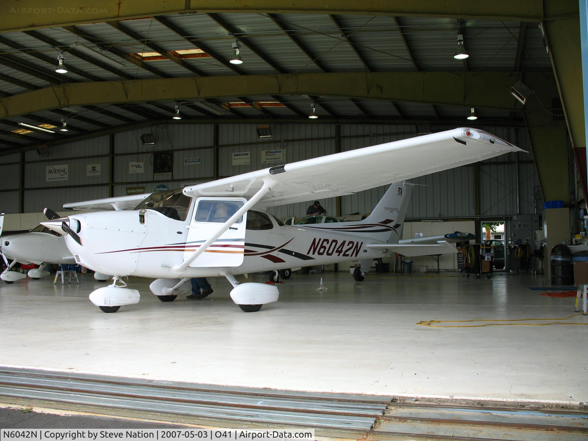 N6042N, 2006 Cessna 172S C/N 172S10228, 2006 Cessna 172S at Woodland Aviation for maintenance @ Watts-Woodland Airport, CA