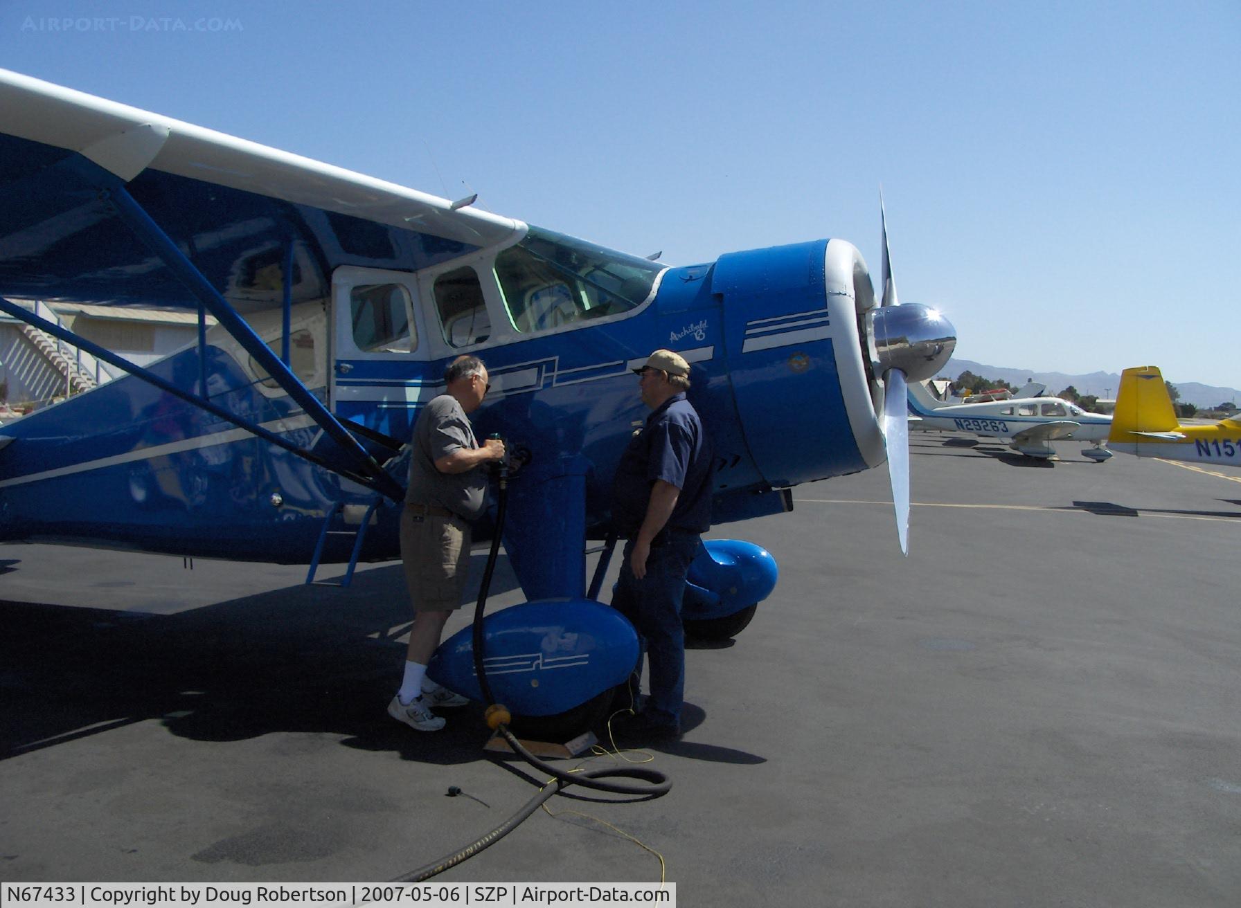 N67433, 1942 Howard Aircraft DGA-15P C/N 563, 1942 Howard DGA-15P, P&W R-985 Wasp Jr. 450 Hp, Archibald 'B', formerly based SZP, refueling, two Howard owners get together