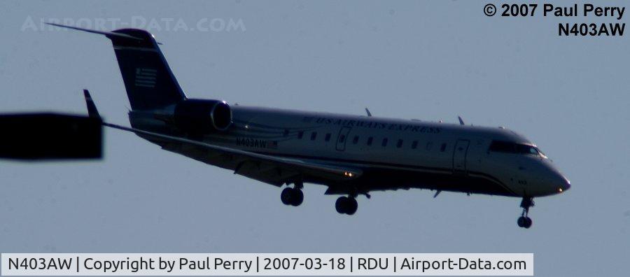 N403AW, 1999 Bombardier CRJ-200LR (CL-600-2B19) C/N 7288, Looks like she's diving for the runway