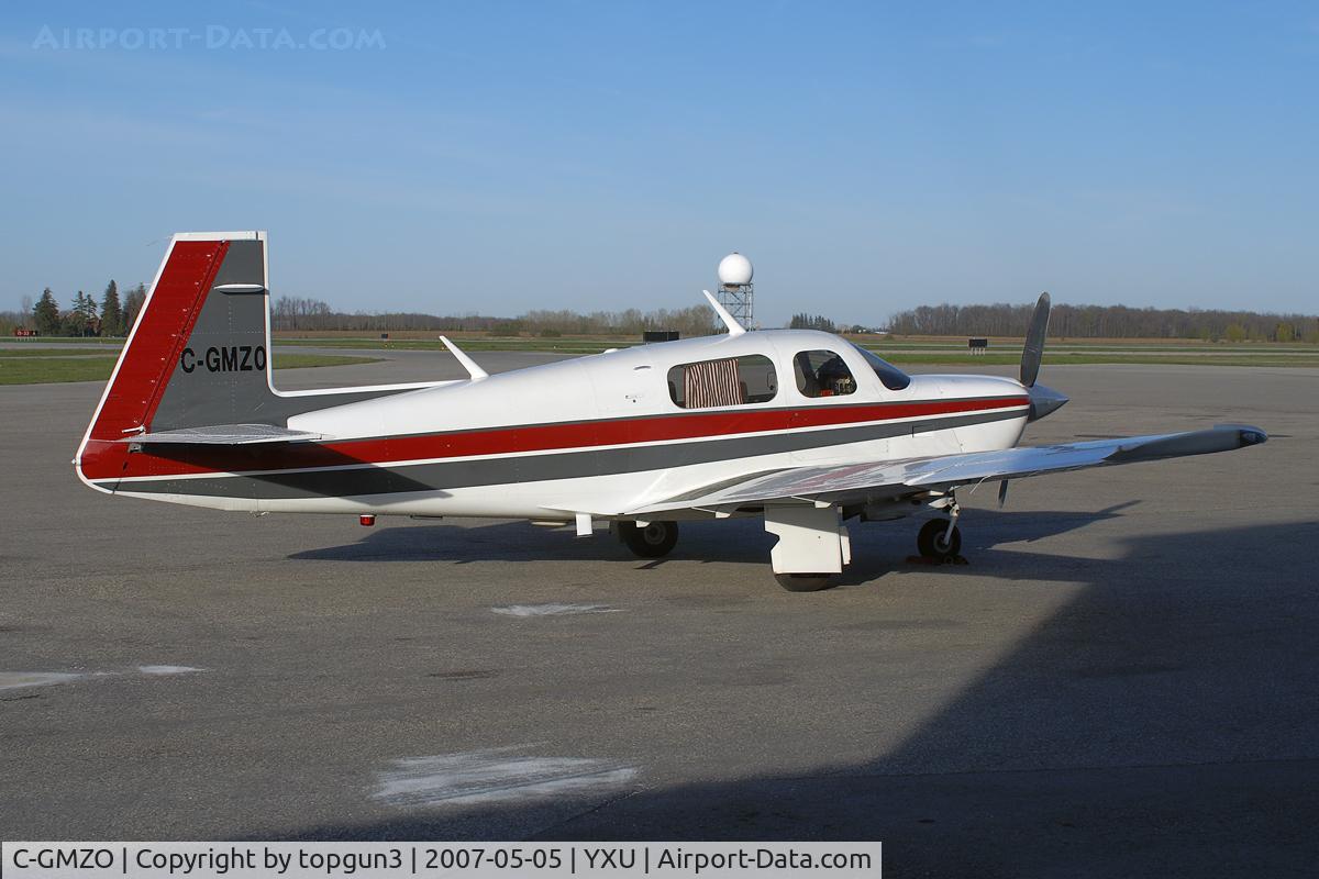 C-GMZO, 1987 Mooney M20J 201 C/N 24-3023, Parked at ESSO ramp.