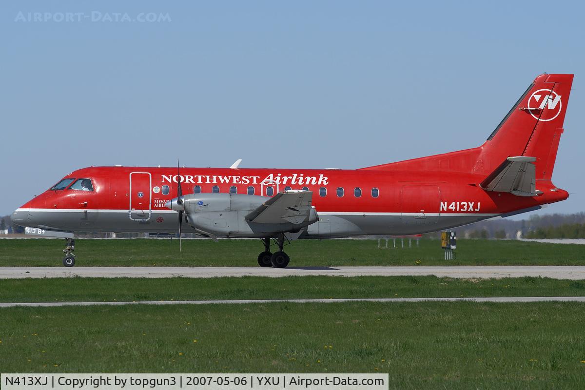 N413XJ, Saab 340B C/N 340B413, Taxiing on Golf for departure.