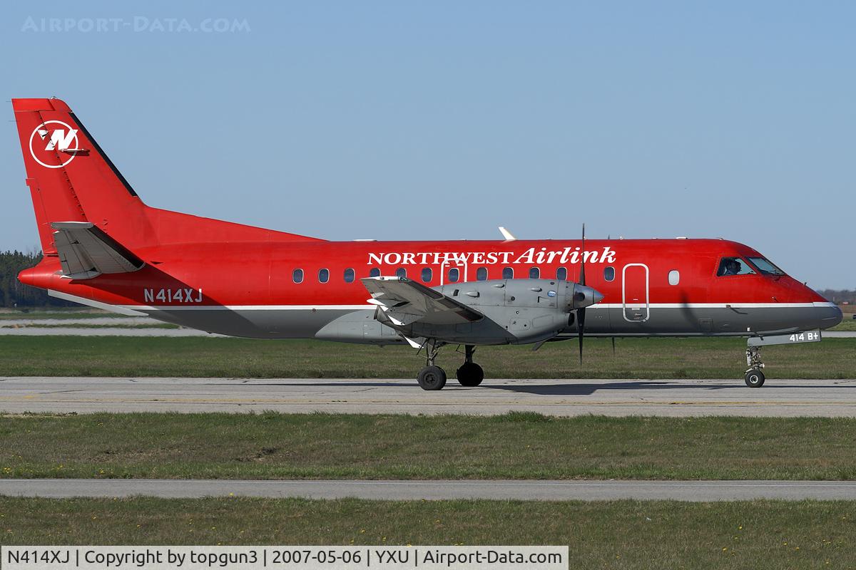 N414XJ, 1997 Saab 340B C/N 340B-414, Taxiing on Golf.