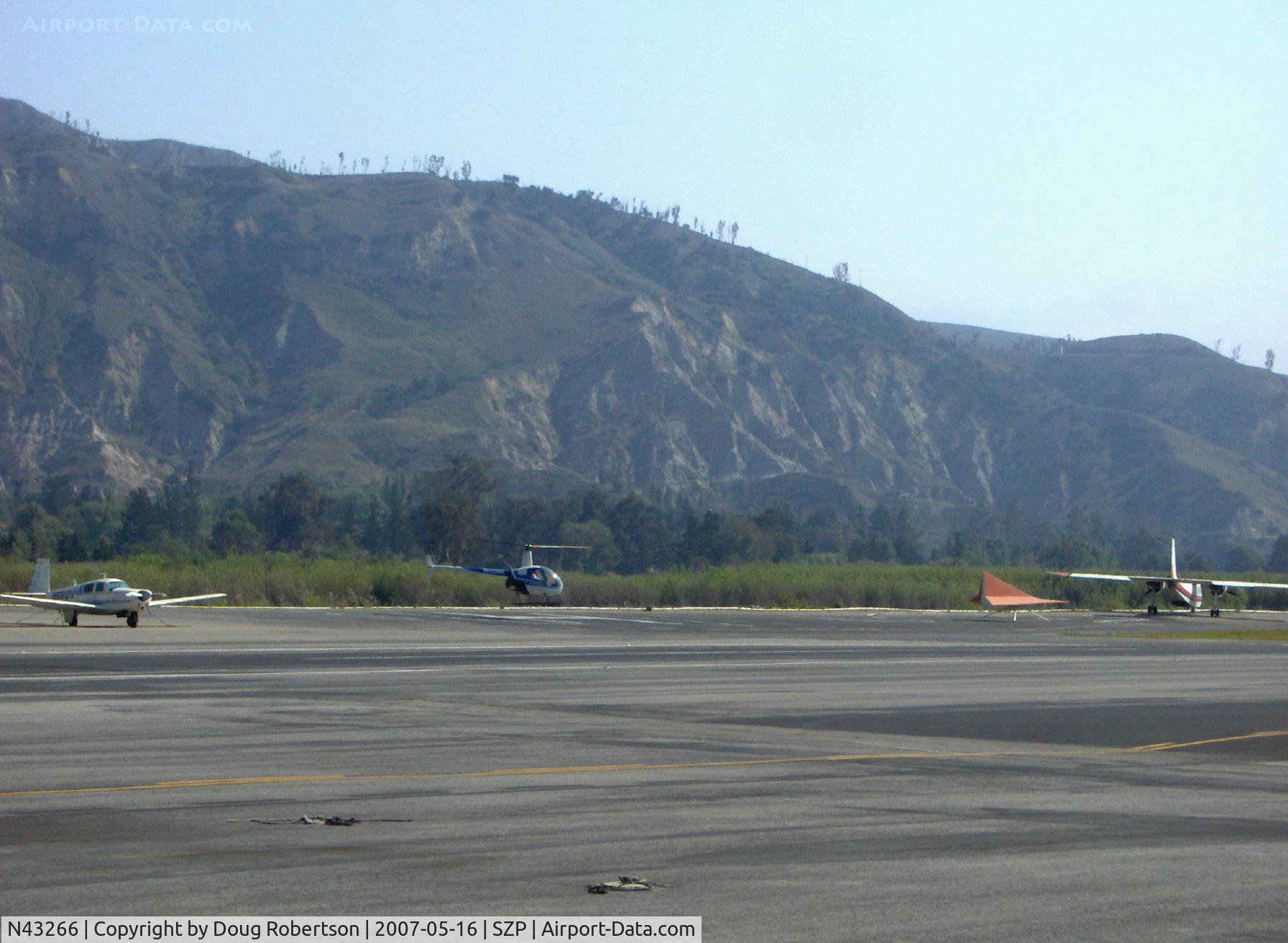 N43266, 1990 Robinson R22 Beta C/N 1268, 1990 Robinson R22 Beta, Lycoming O-320-BC, landing approach to SZP's helipad