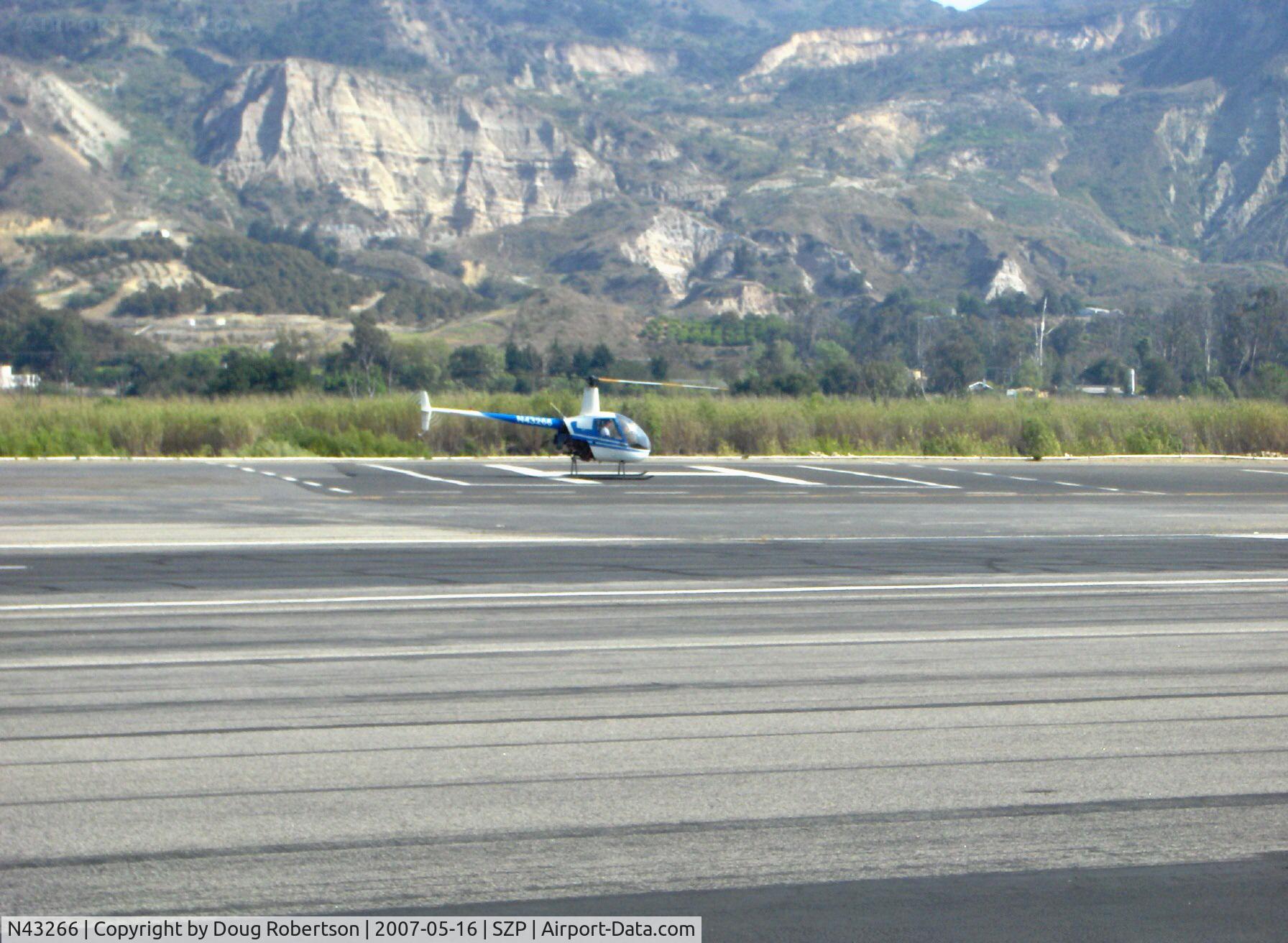 N43266, 1990 Robinson R22 Beta C/N 1268, 1990 Robinson R22 Beta, Lycoming O-320-BC, on SZP's helipad