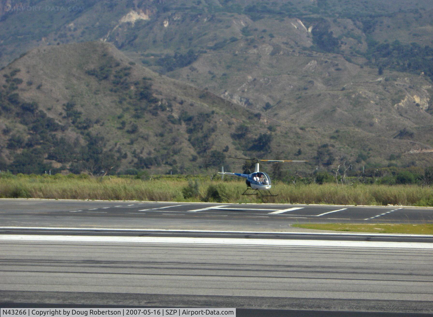N43266, 1990 Robinson R22 Beta C/N 1268, 1990 Robinson R22 Beta, Lycoming O-320-BC, takeoff hover