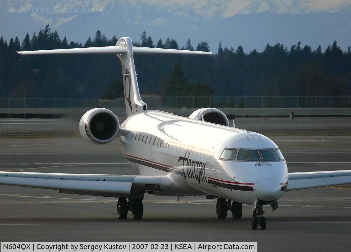 N604QX, 2001 Bombardier CRJ-701 (CL-600-2C10) C/N 10019, Evening arrival at Seatac