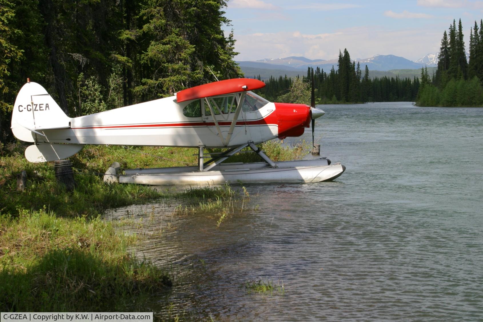 C-GZEA, 1947 Piper PA-12S Super Cruiser C/N 12-2850, docked at Thomas River
