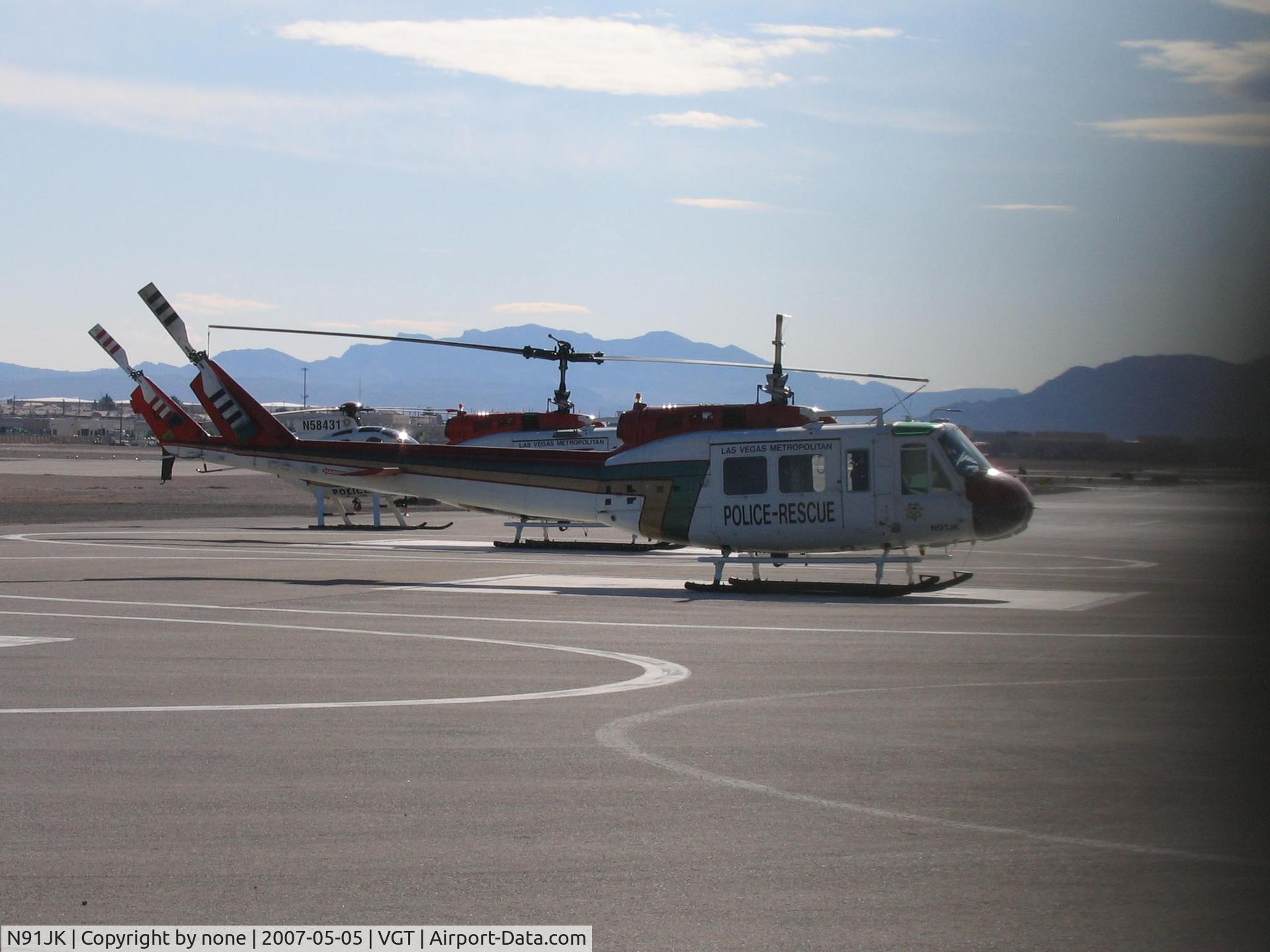 N91JK, Bell HH-1H Iroquois C/N 17126, N91JK at LVMPDSAR (Las Vegas Metro Police Department Search And Rescue) rotor maintenance.