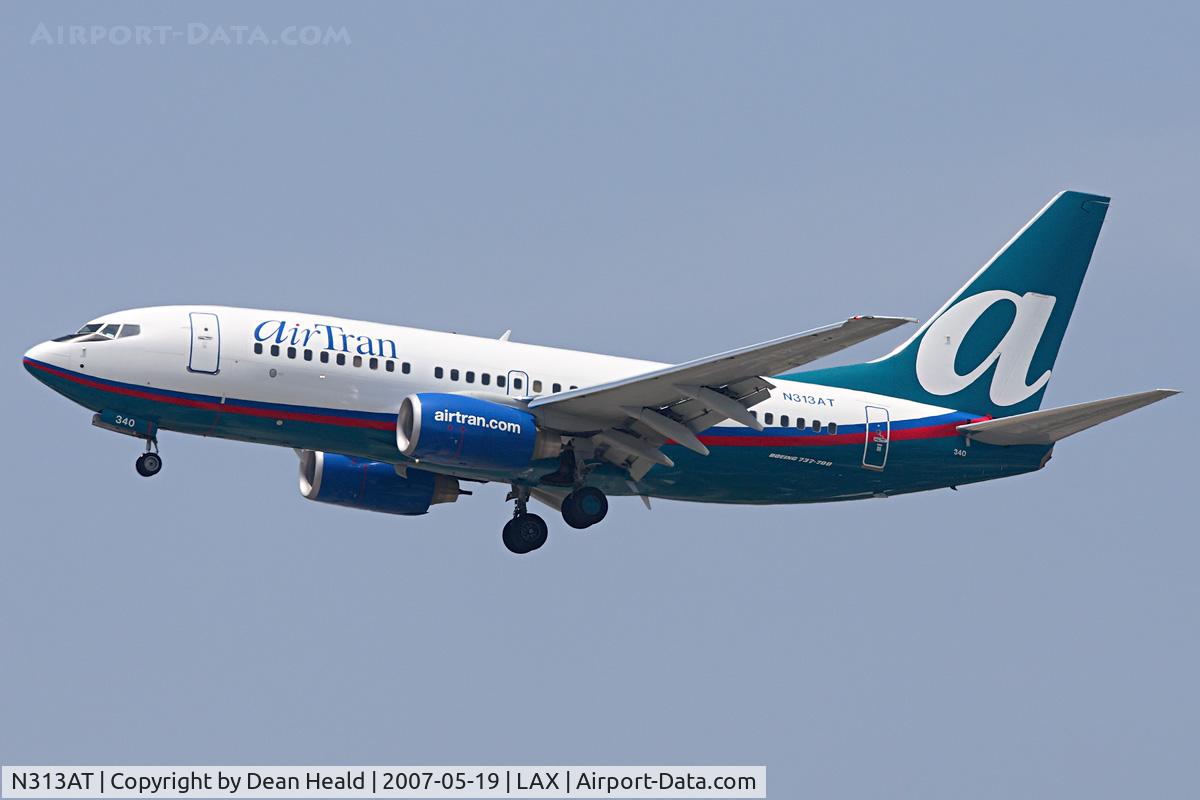 N313AT, 2007 Boeing 737-7BD C/N 33927, AirTran Airways N313AT (FLT TRS47) from Hartsfield Jackson Atlanta Int'l (KATL) on short-final to RWY 24R.
